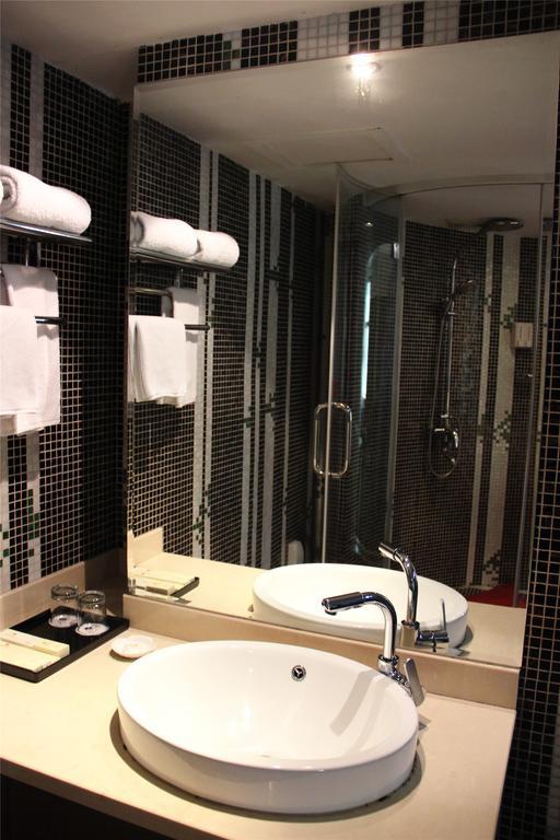 Manhattan Jinling Hotel Šanghaj Pokoj fotografie